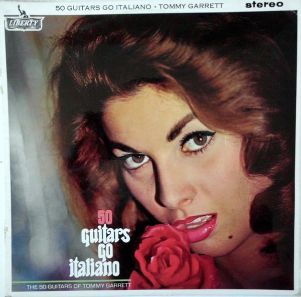 Виниловая пластинка 50 ГИТАР ТОММИ ГАРРЕТТА 50 Guitars Go Italiano SLBY1203 Liberty 1964 Великобритания Джаз Б/у brown RecordCityJP