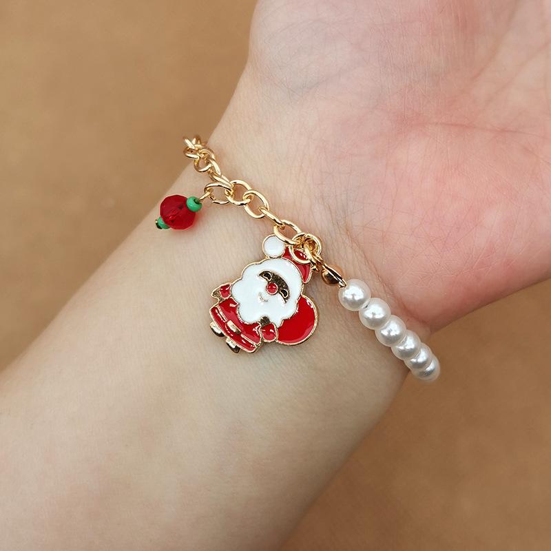 Festive Alloy Christmas Bracelet with Santa, Snowman, Reindeer, and Snowflake Charms beige The Best Experience
