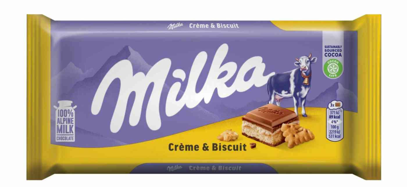 Шоколад молочный Milka с молочной начинкой со вкусом ванили и кусочками печенья