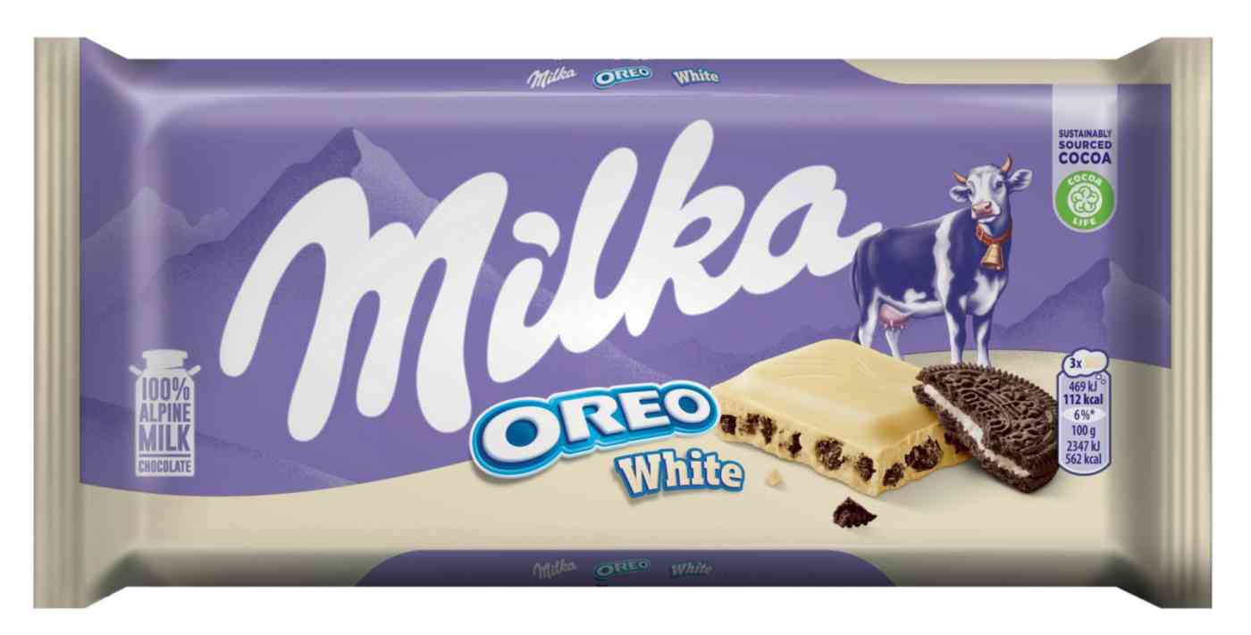 Шоколад белый Milka со сливочно-ванильной начинкой и кусочками печенья Орео